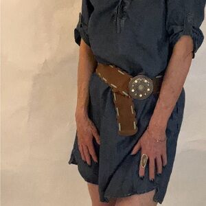 This is a soft denim dress paired with a belt @ boots.